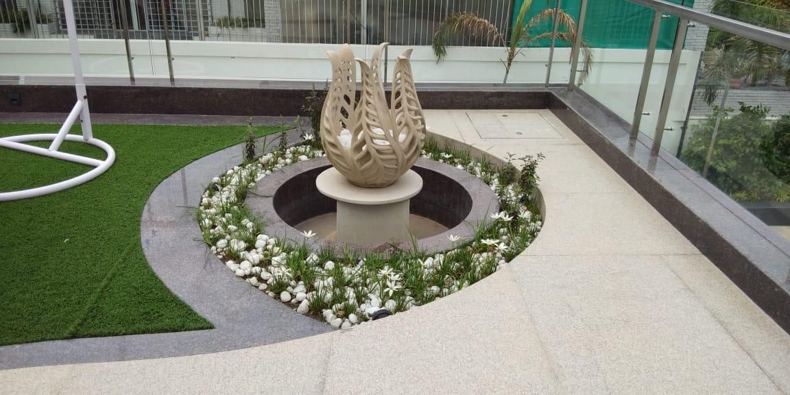 Courtyard fountain — landscaping by Choudhary Garden Services